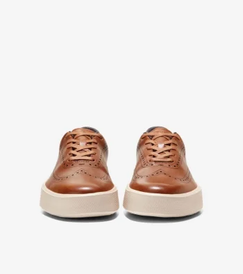Discount Cole Haan Men's GrandPr&oslash; Crew Wingtip Sneakers BritishTan-Birch